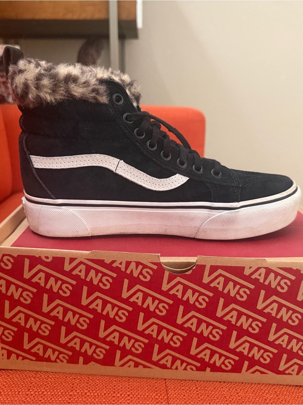 Vans Women's Black High-Top Sneakers with White Stripe and Faux Fur